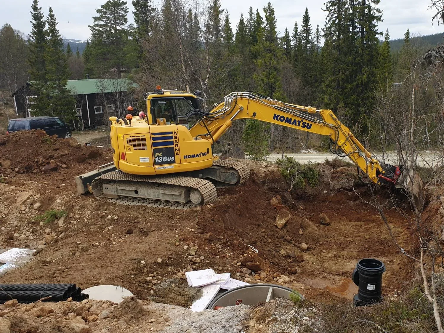 Komatsu PC138US bandgrävare